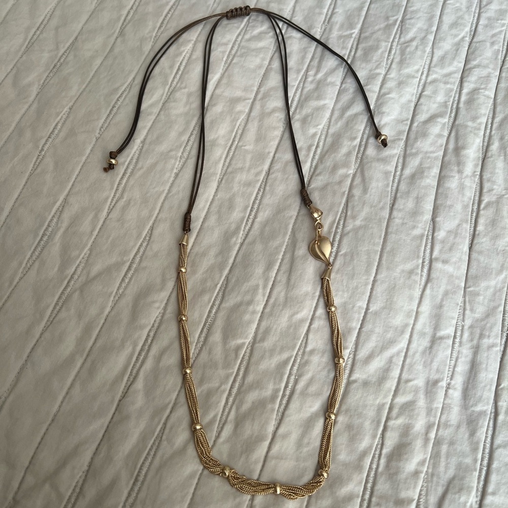 Gold Necklace with Leather Cord